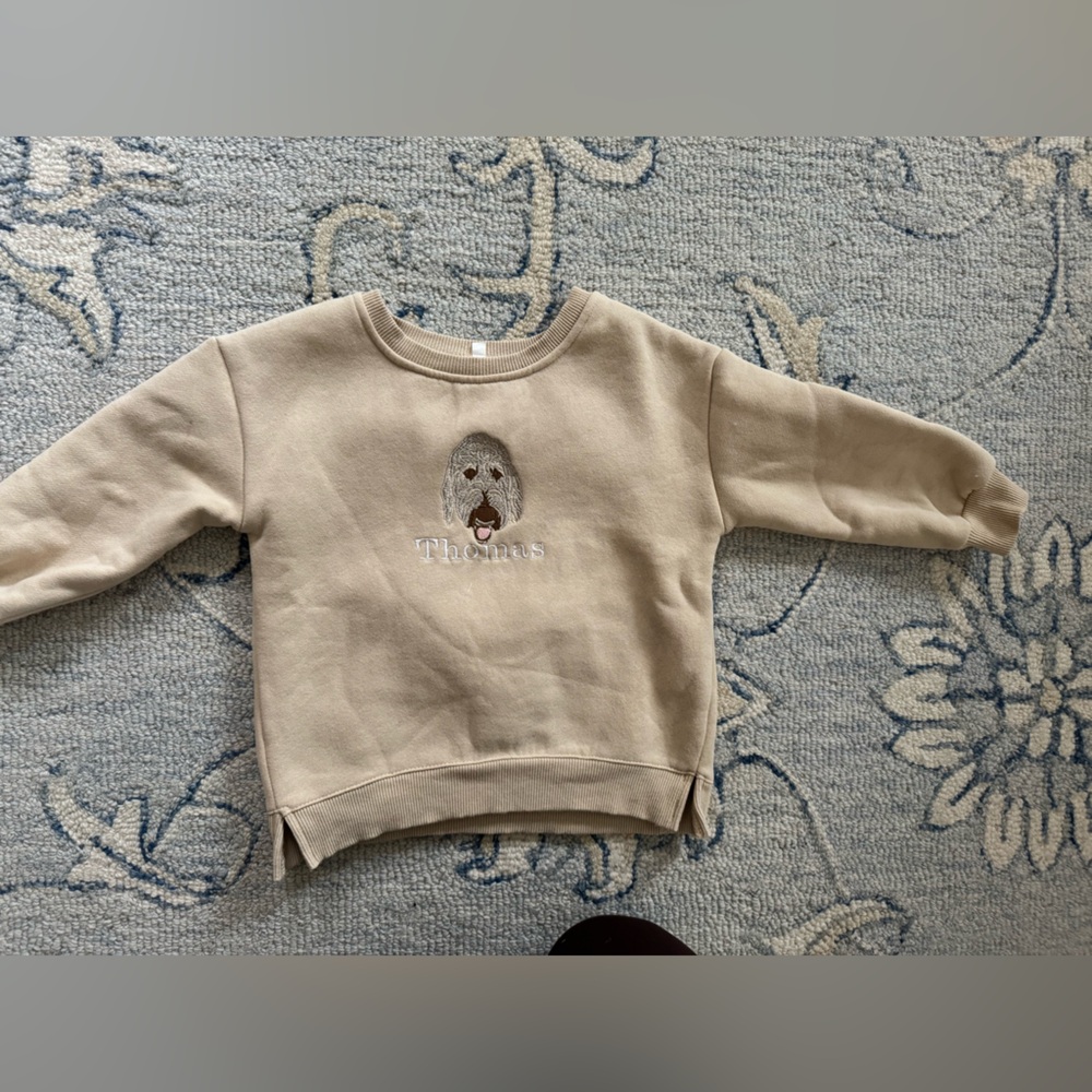 Beige Dog Sweatshirt. Embroidered with Thomas and golden doodle. Size 2T